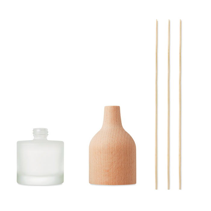 a transparent diffuser with a brown top and brown fragrance sticks 