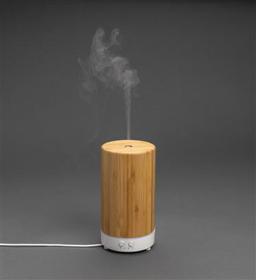Light brown diffuser with a white base, cylinder shape, shown on display
