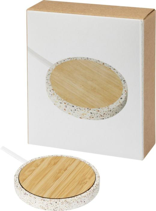 Charging pad (light brown in colour with a cream colour edge) with Kraft packaging