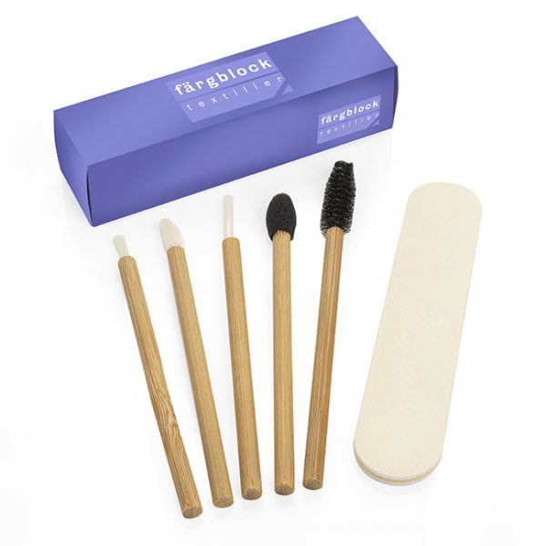 A makeup set with brushes and nail file