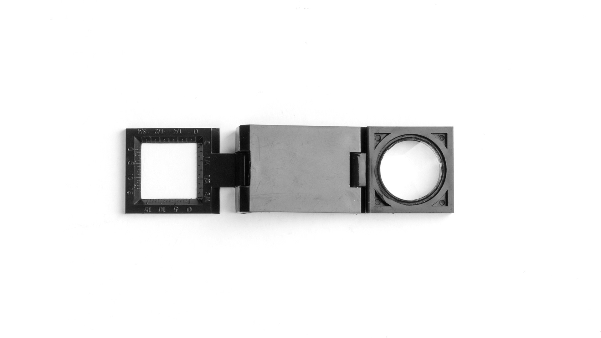 black foldable magnifier flattened