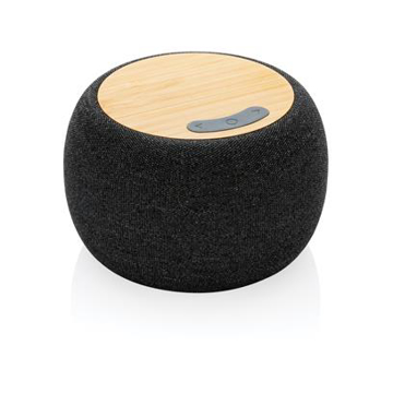 black speaker with light brown top and a grey button, circular shape