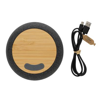 black speaker with light brown top and a grey button, circular shape, with its black cable next to the speaker