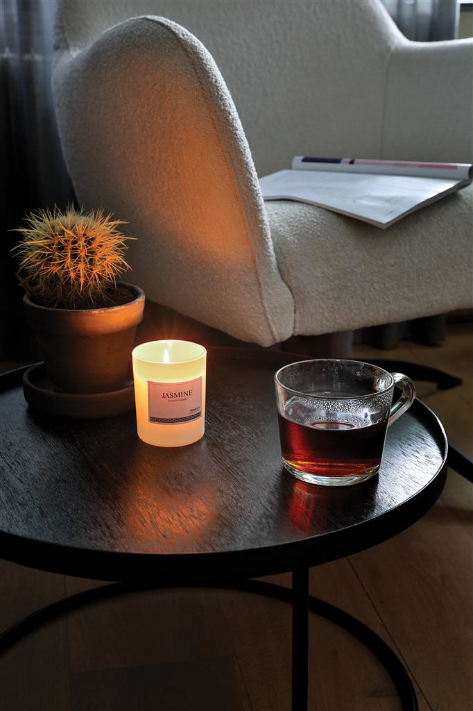 Small Candle in glass jar.