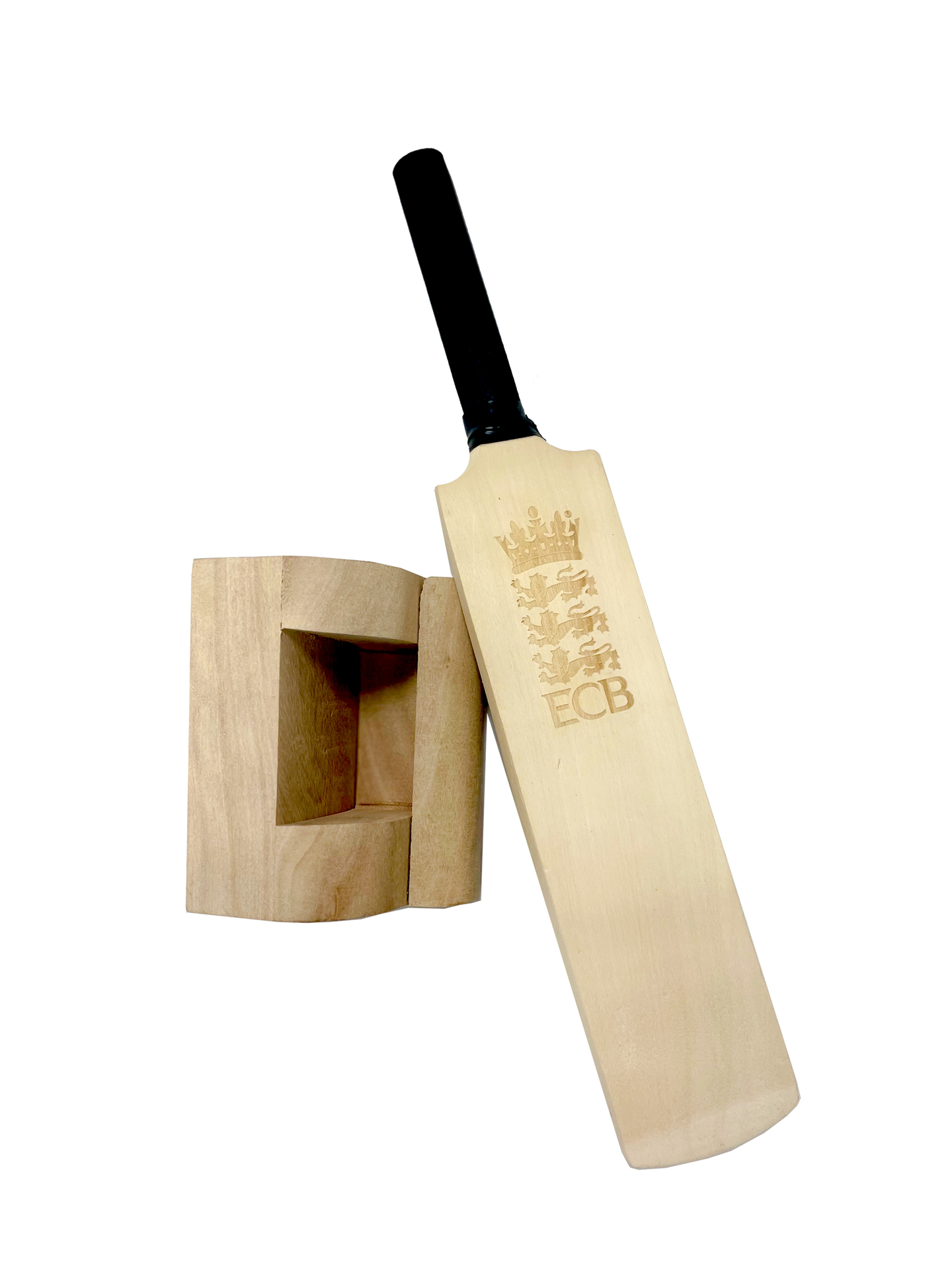 A light brown mini cricket bat next to its stand