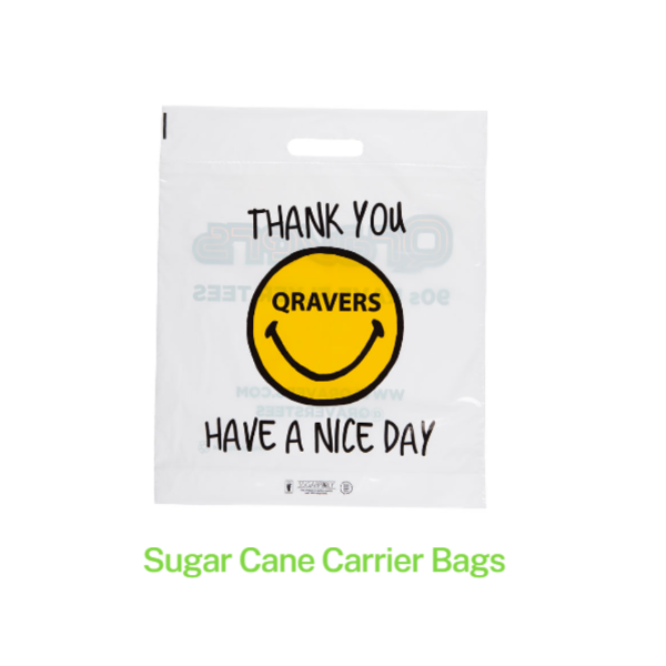 A sugar cane plastic carrier bag with a smiley face on it