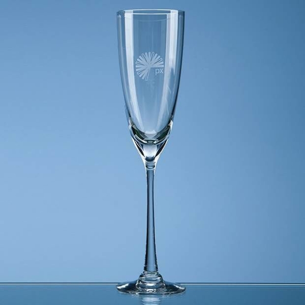crystal champagne glass with engraving to the side