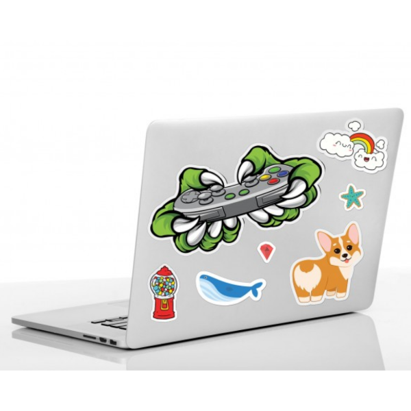 multiple laptop stickers on laptop