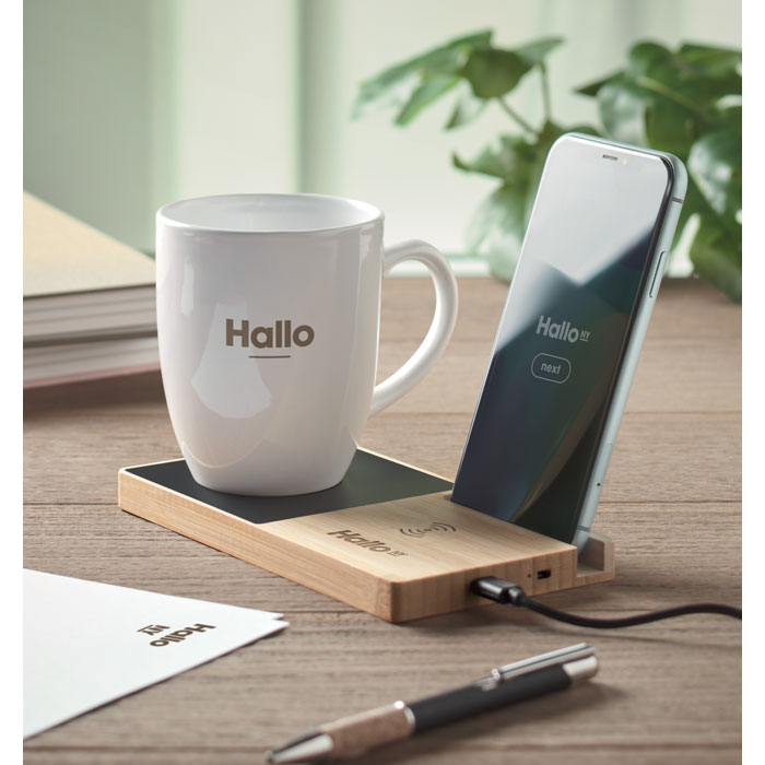 Wireless charger in bamboo including a mug warmer and phone stand with mug warming